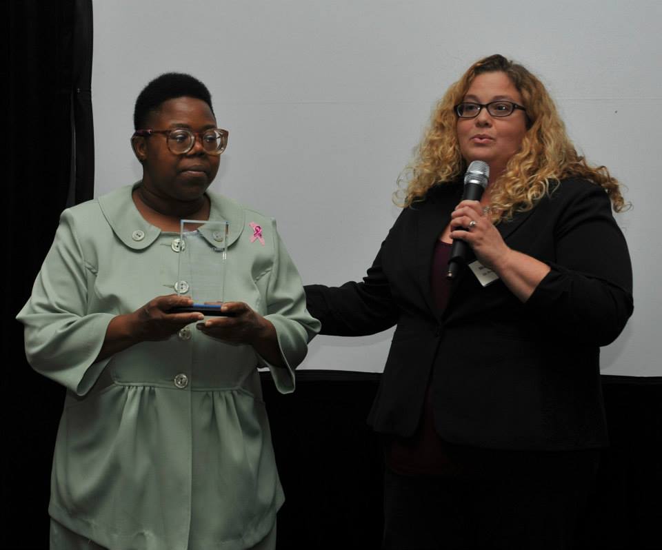 Michelle Flynn recognizes Associate of the Year Annette Jenkins