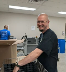 A person working at one of the Eggleston services facilities, as part of a supported employment program.